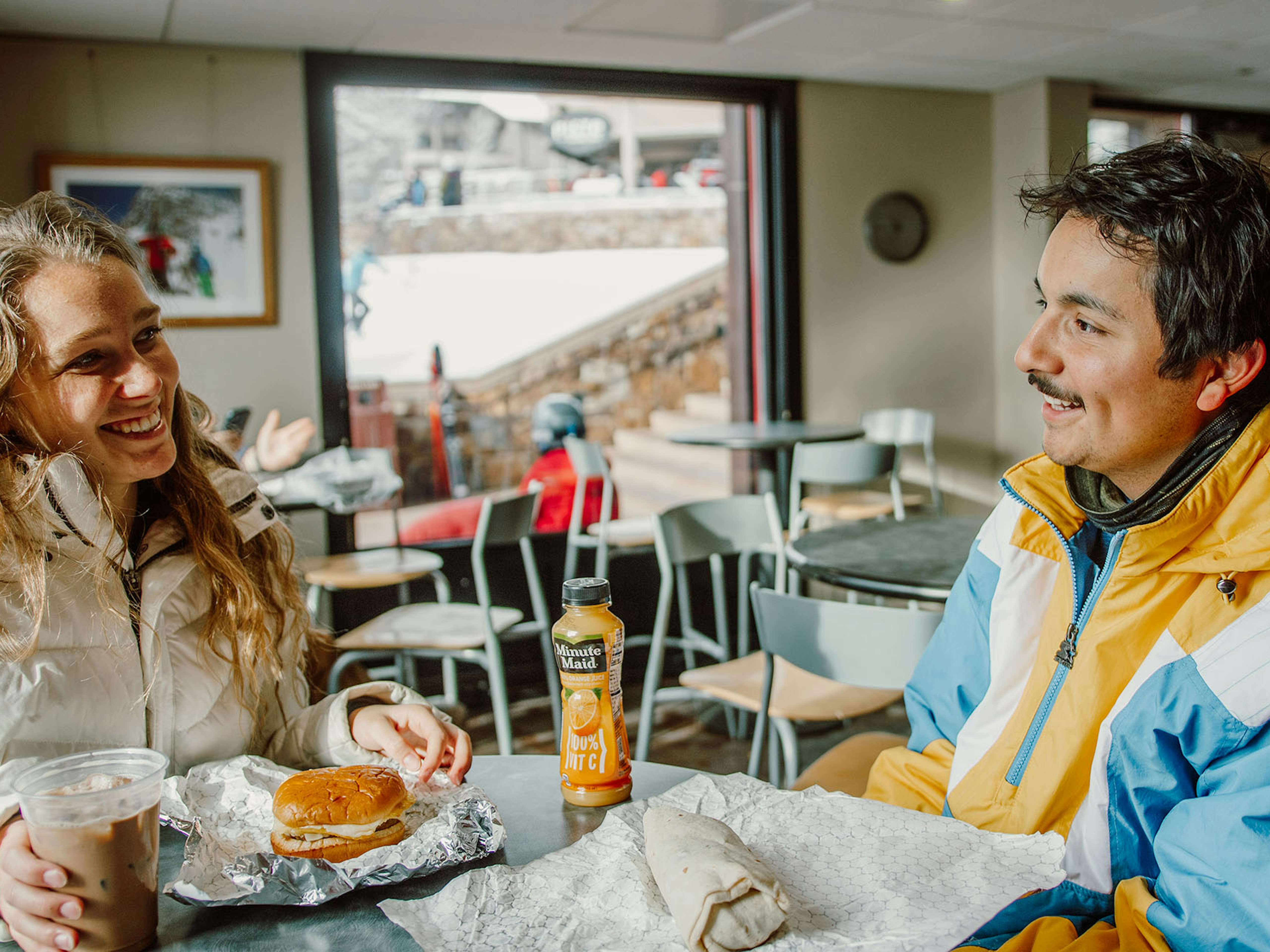 People enjoying food at cafe 6311